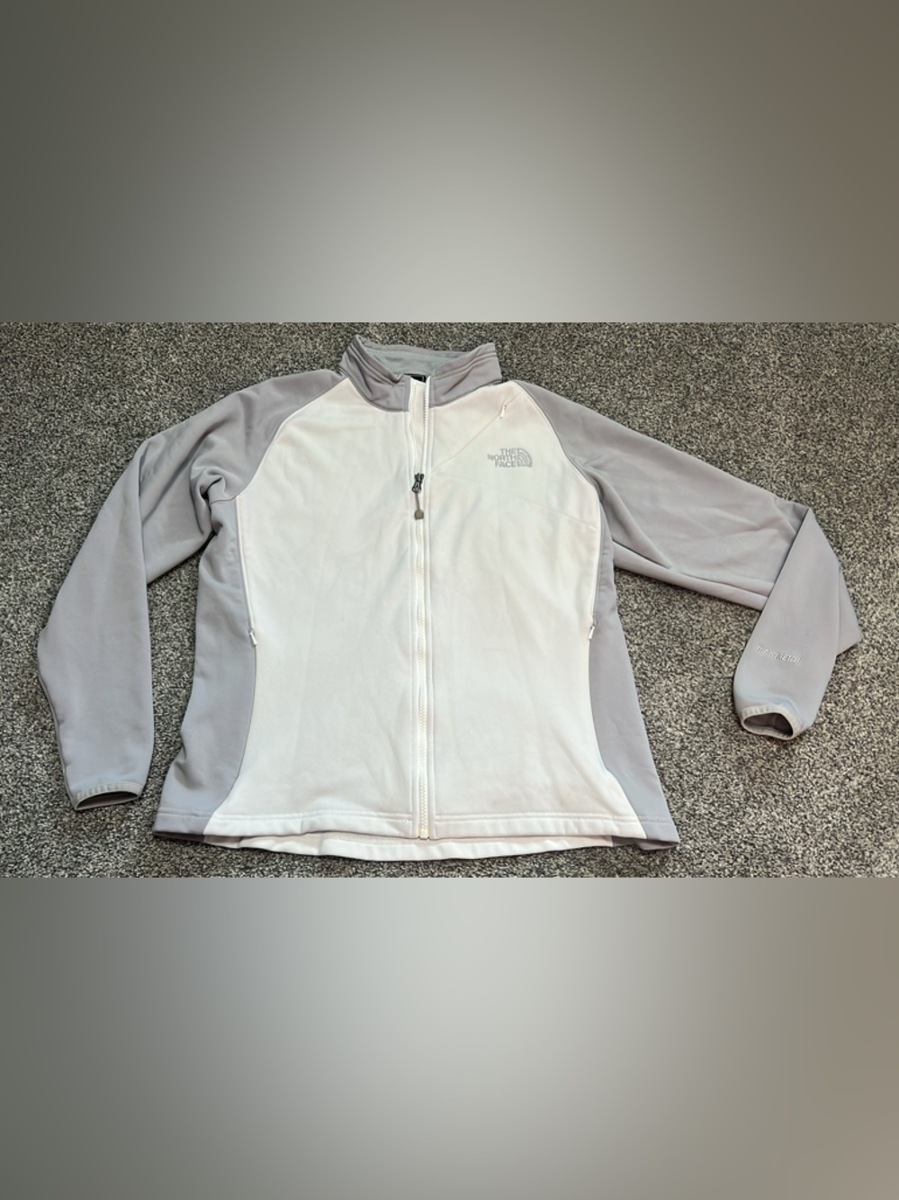 Woman’s Large Northface light weight zip up jacket